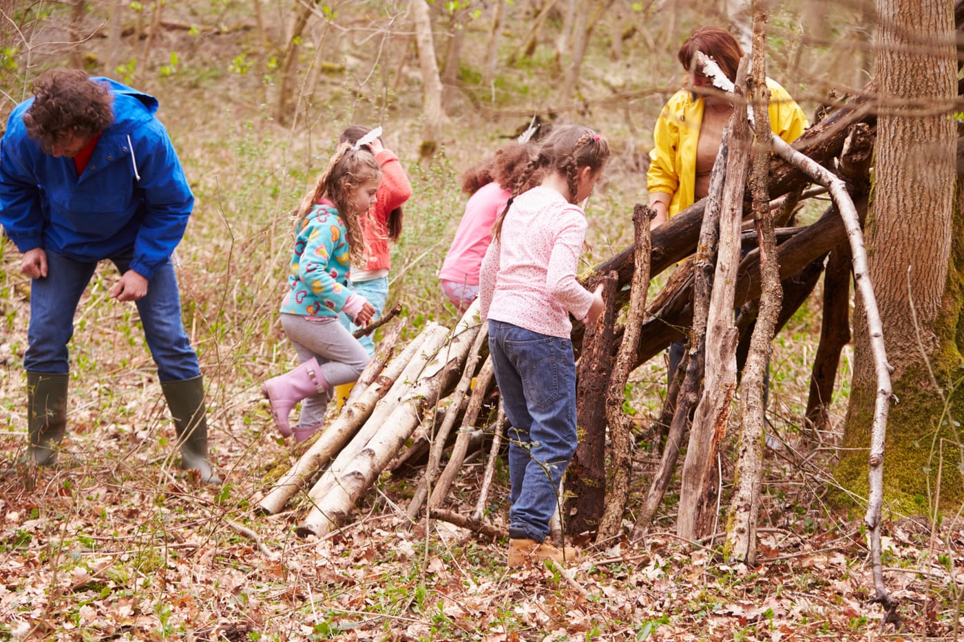 Den and shelter building in the woods